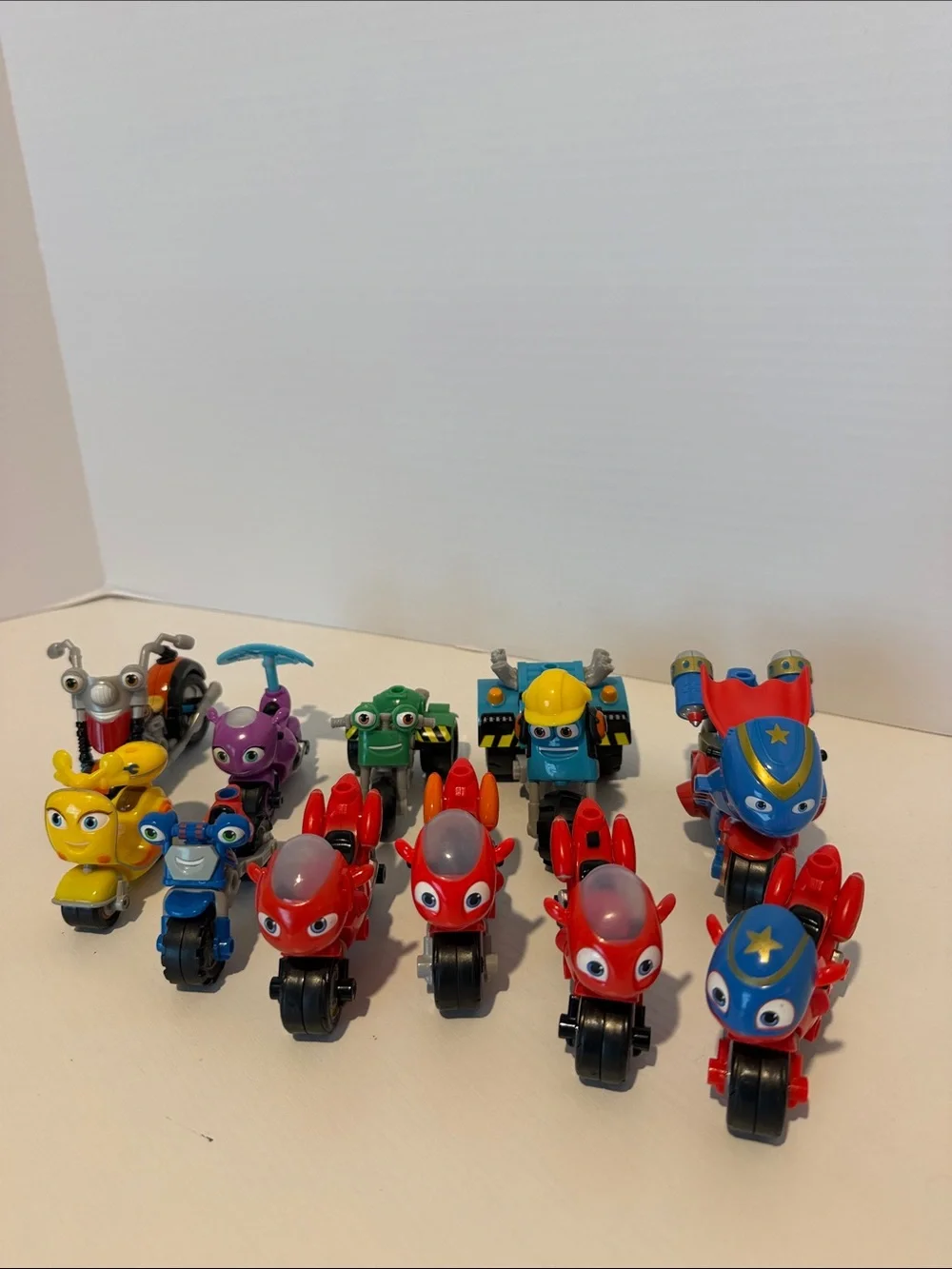 Ricky Zoom Kids Toy Motorbike Figures - Red, Blue, Yellow, Green (11 pieces)